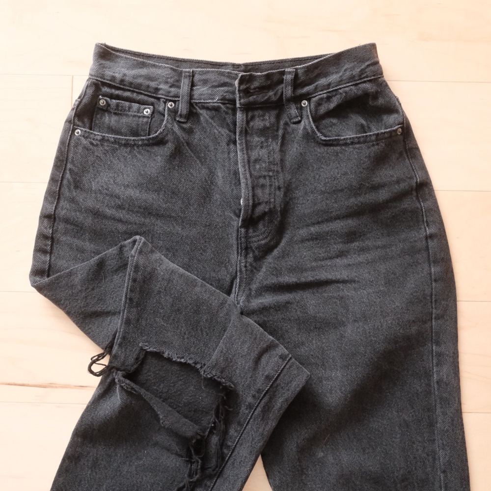 Distressed black dad jeans